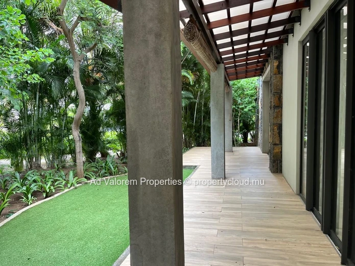 Exceptional corner apartment with private garden and heated swimming pool!