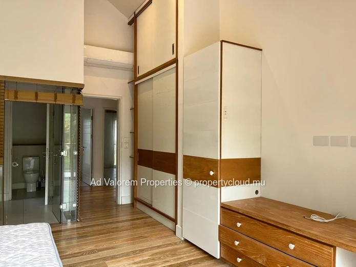 Exceptional corner apartment with private garden and heated swimming pool!