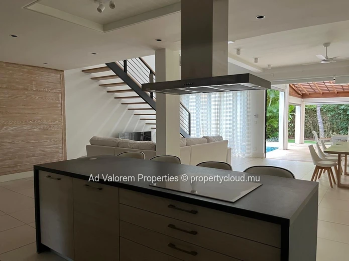 Exceptional corner apartment with private garden and heated swimming pool!