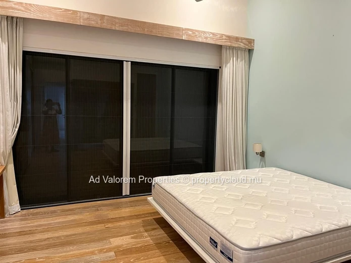 Exceptional corner apartment with private garden and heated swimming pool!