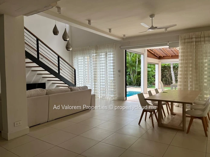 Exceptional corner apartment with private garden and heated swimming pool!
