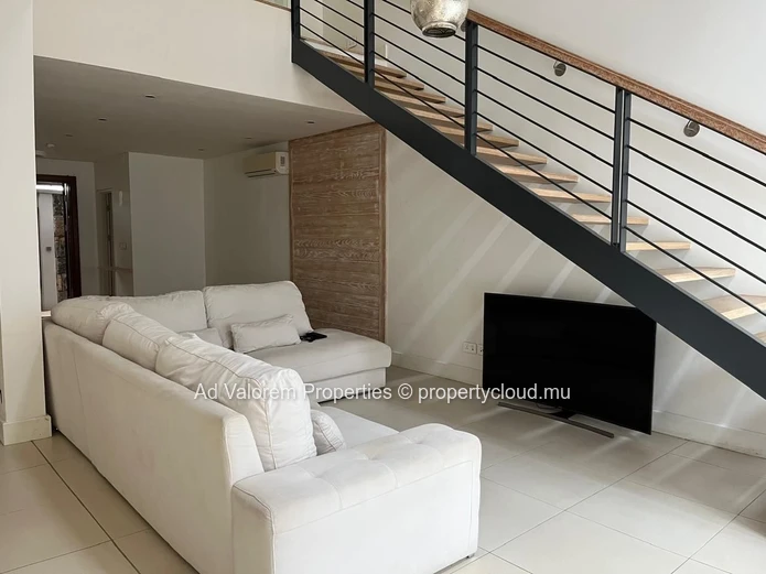 Exceptional corner apartment with private garden and heated swimming pool!